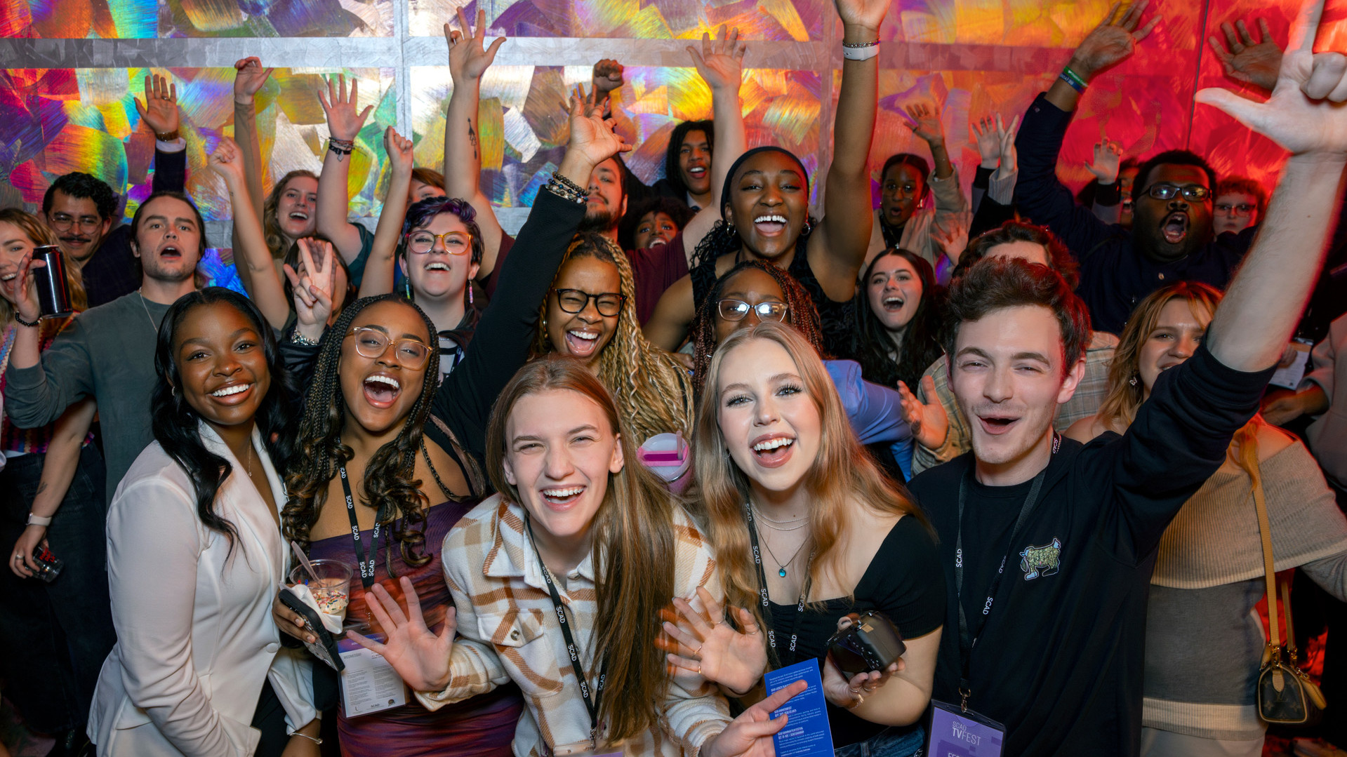 group of smiling students at festival
